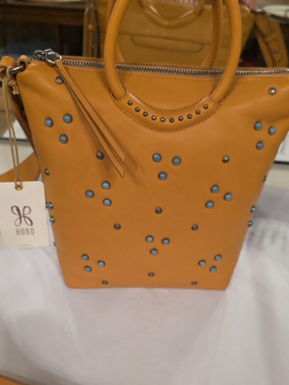 HOBO Tan Leather Tote Crossbody with Turquoise Studs